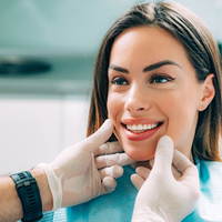 Woman having a smile makeover consultation with a dentist