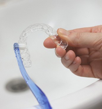 toothbrush, Invisalign, and the sink