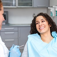 Smiling woman in dental chair