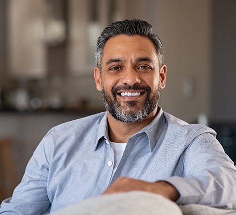 smiling mature man at home