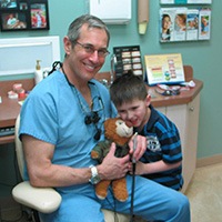 Dr. Brooks working with young patient