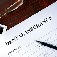 Dental insurance paperwork for the cost of Invisalign in Winthrop 