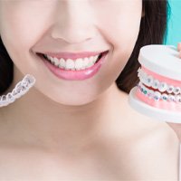 woman enjoying the benefits of Invisalign in Winthrop without braces 