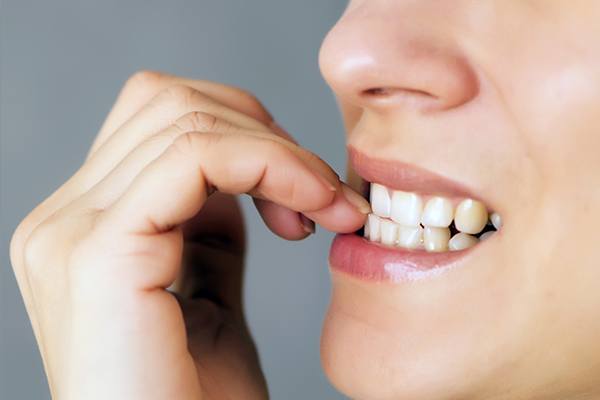 Person biting nails