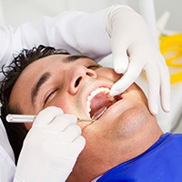 Patient receiving dental exam