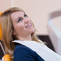 Smiling woman in dental chair