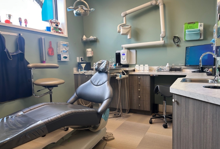 Dental treatment room with light blue walls