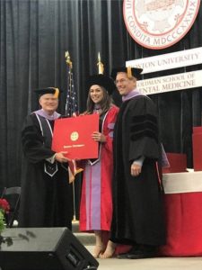 Dr. Stephanie receiving degree