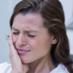 woman with mouth pain