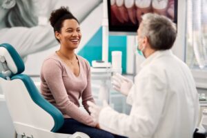 female patient and dentist talking